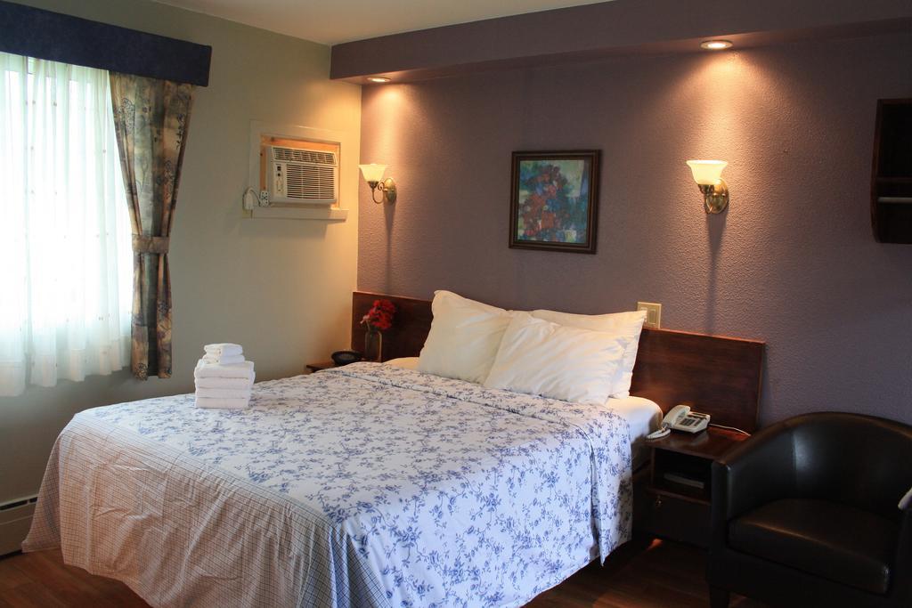 Au Doc Motel Repentigny Habitación foto